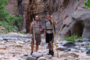 Chad Kempel and his brother with walking sticks in the Narrows, Zion National Park, 2014