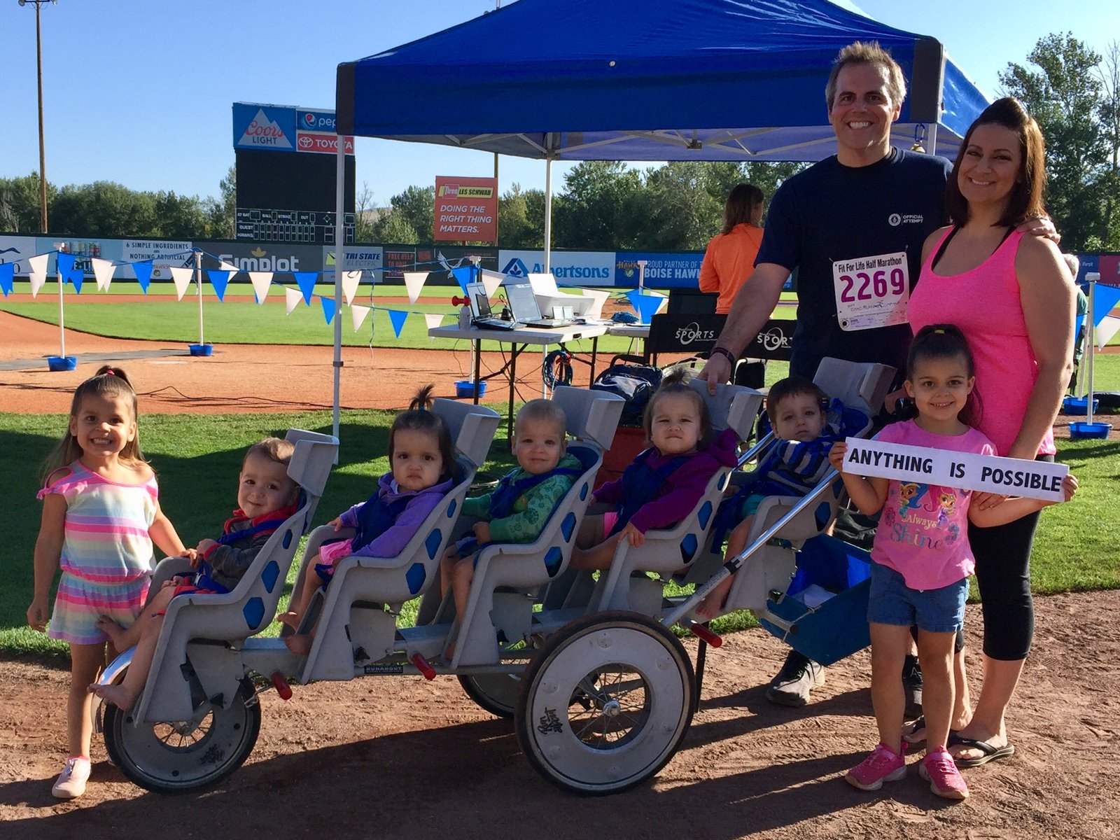 Chad Kempel with the quintuple stroller after the 10K record