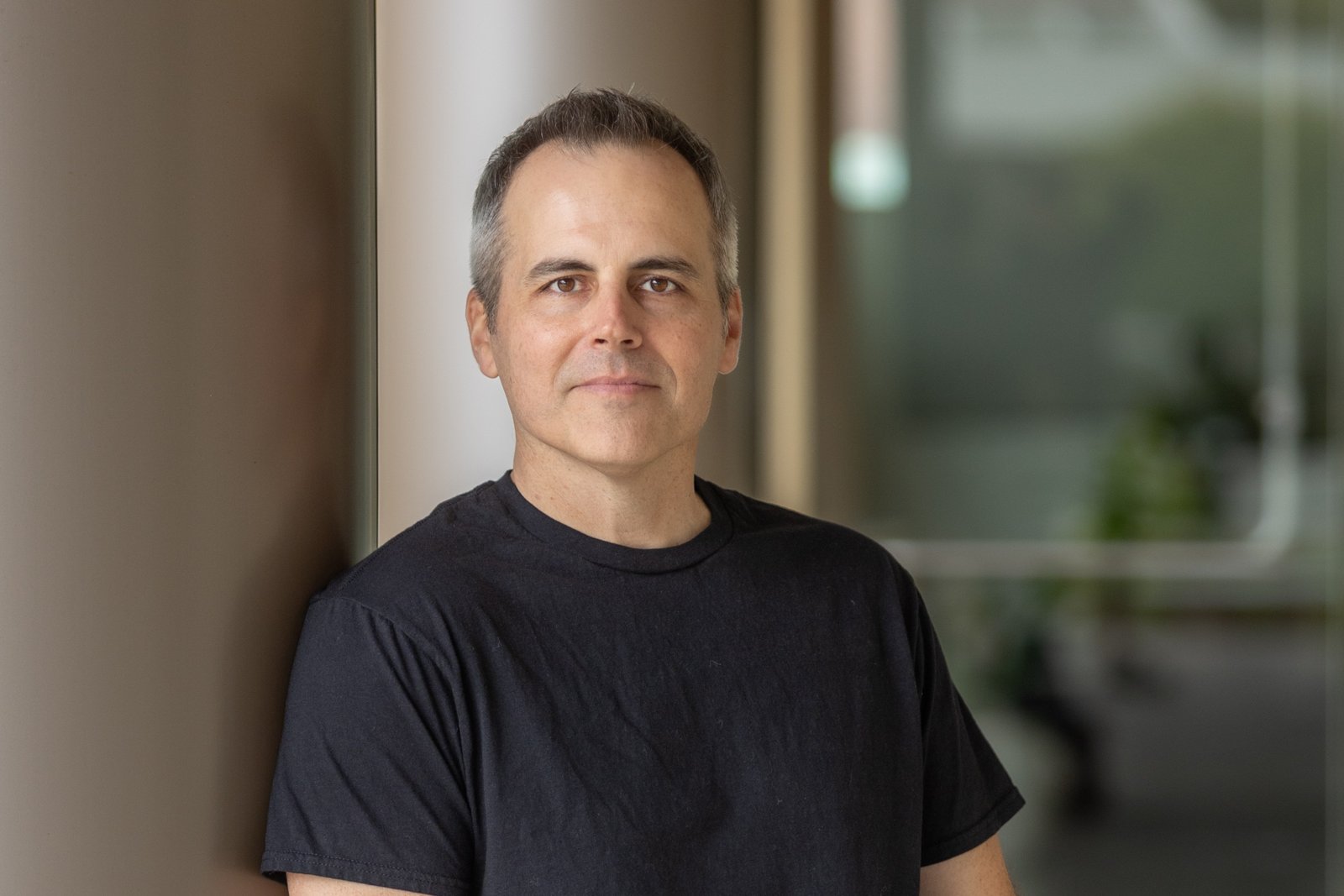 Chad Kempel, studio portrait in black t-shirt