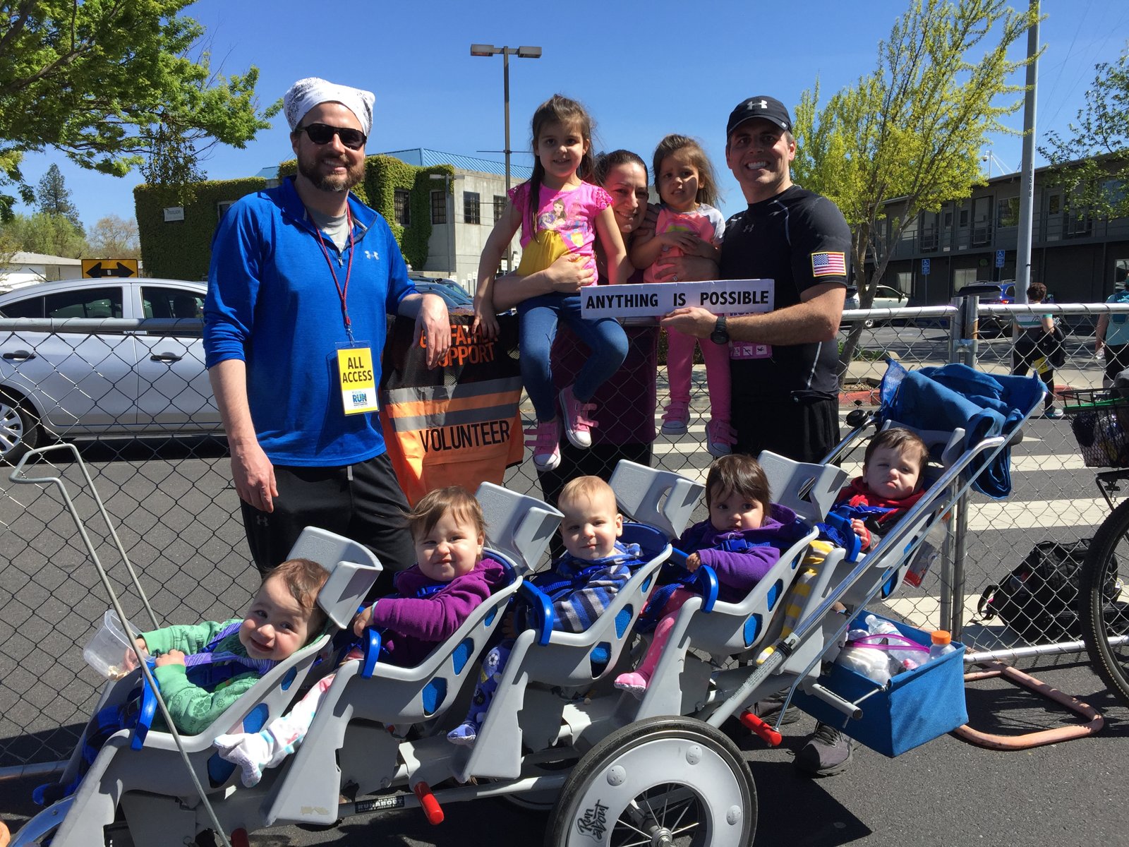 Chad Kempel with his family and the quintuple stroller after the Modesto Marathon